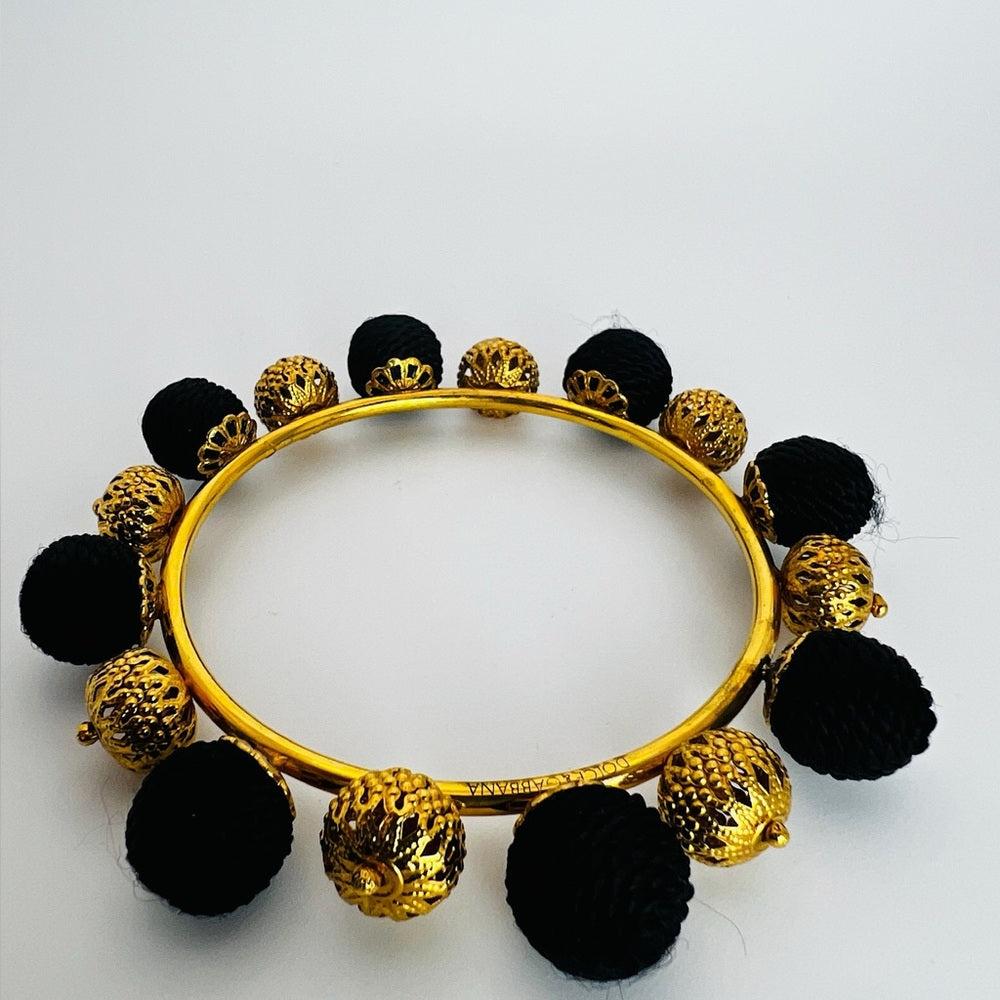 Dolce Gabbana Authentic Black Gold Bangle bracelet pom pom