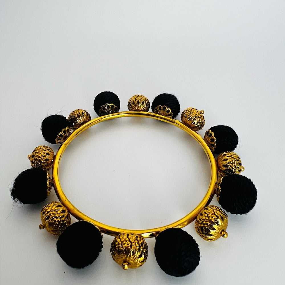 Dolce Gabbana Authentic Black Gold Bangle bracelet pom pom