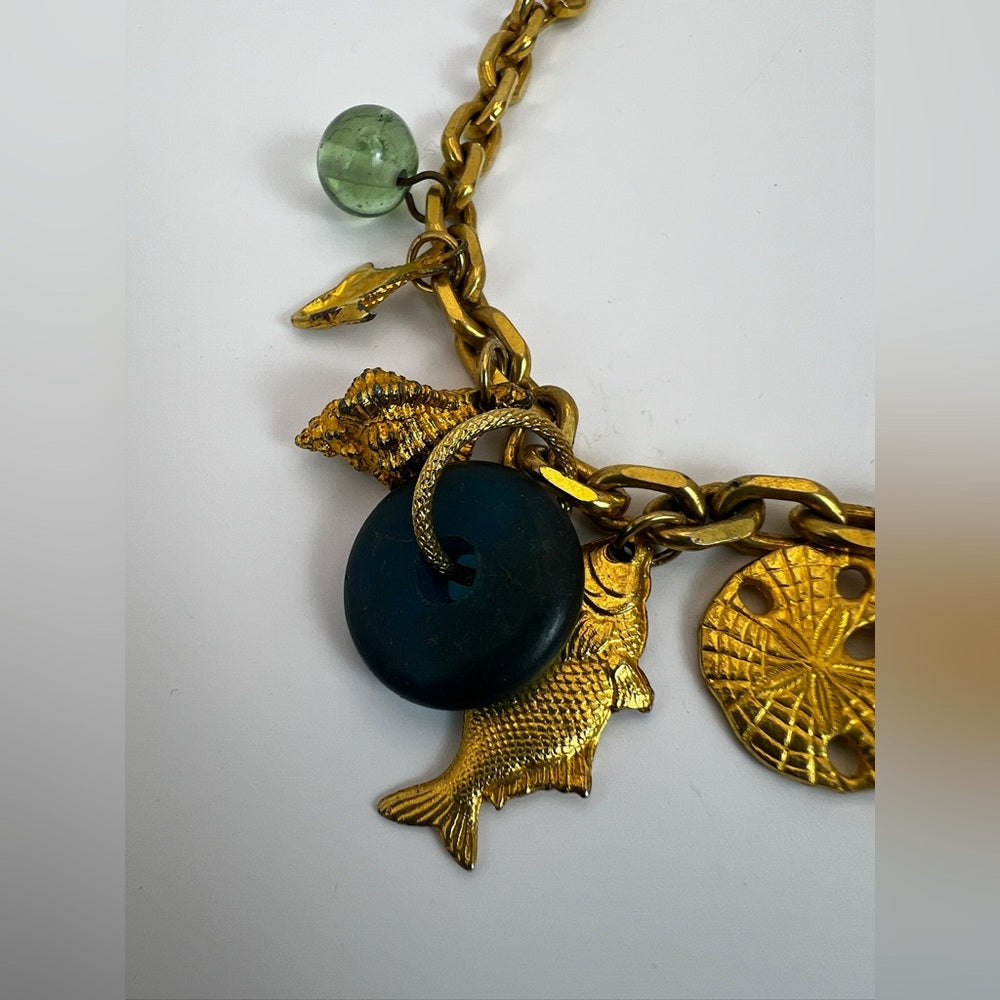 Gold tone nautical charm necklace