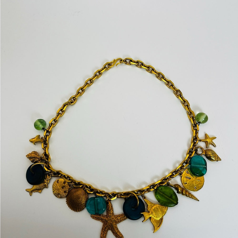 Gold tone nautical charm necklace