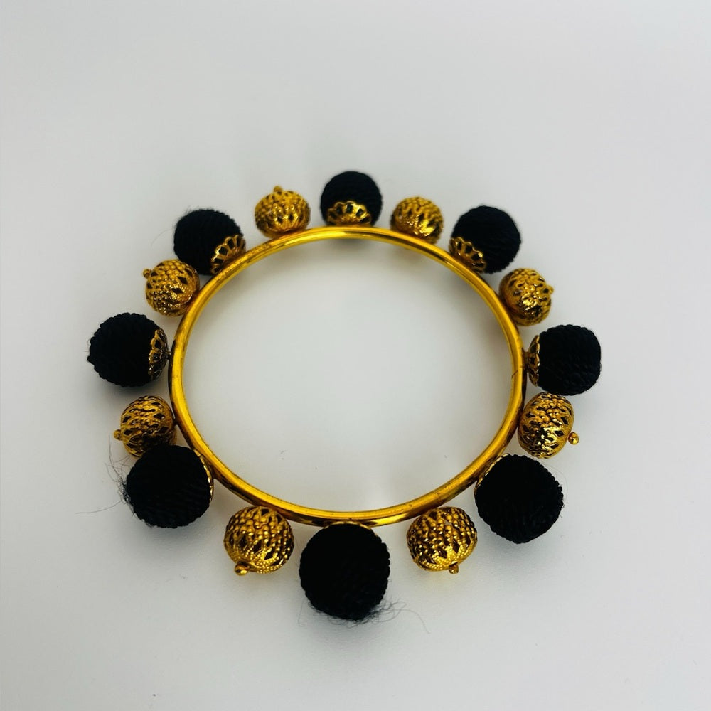 Dolce Gabbana Authentic Black Gold Bangle bracelet pom pom
